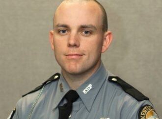 Man charged in the fatal shooting of Kentucky state trooper was wanted on a parole violation