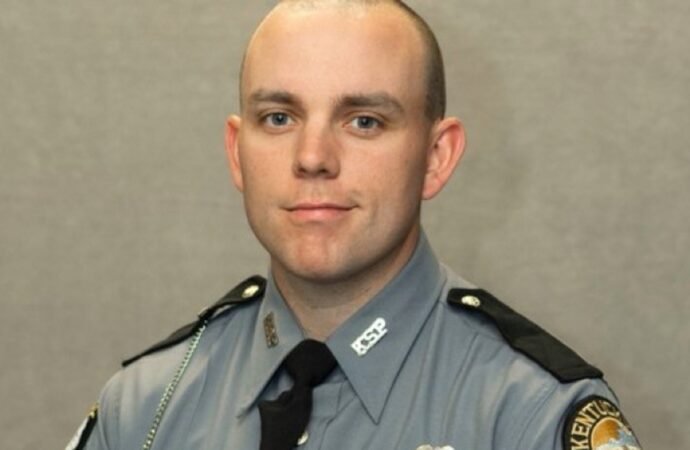 Man charged in the fatal shooting of Kentucky state trooper was wanted on a parole violation