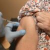Medical groups offer vaccine guidance to fill federal vacuum