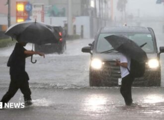 Millions urged to evacuate as Typhoon Dujuan hits Japan