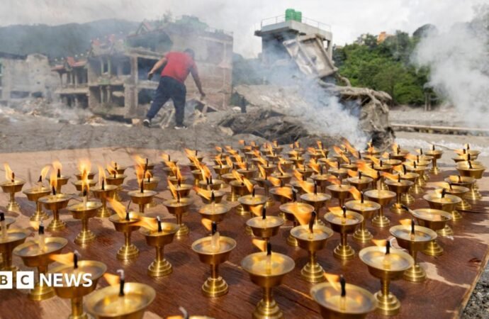 Nepal holds national day of mourning for victims of flash flood disaster
