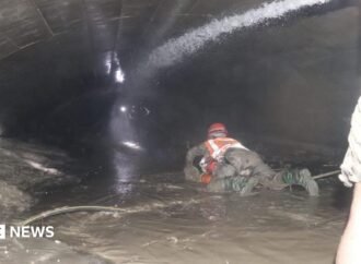 Nepal rescuers try to reach dozens trapped in tunnel after two pulled out alive