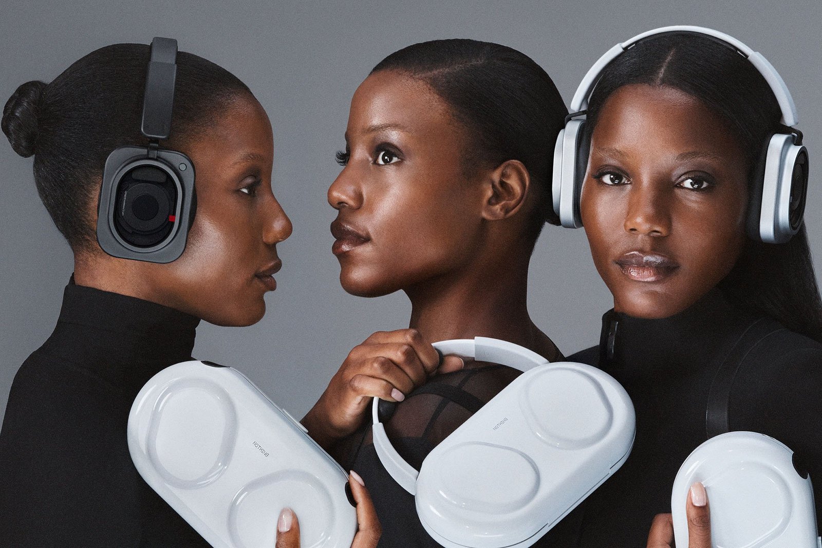 Female triplets shown wearing the Nothing Headphone (1) Pro and holding its carrying case