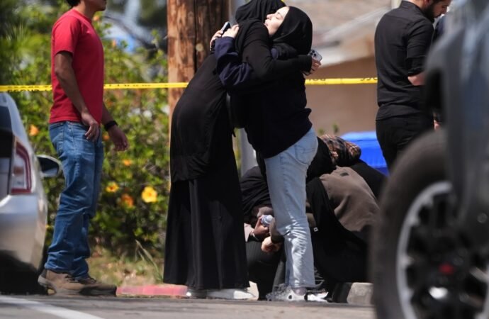 Parents of San Diego mosque gunman say a mental health facility failed to heed FBI warning