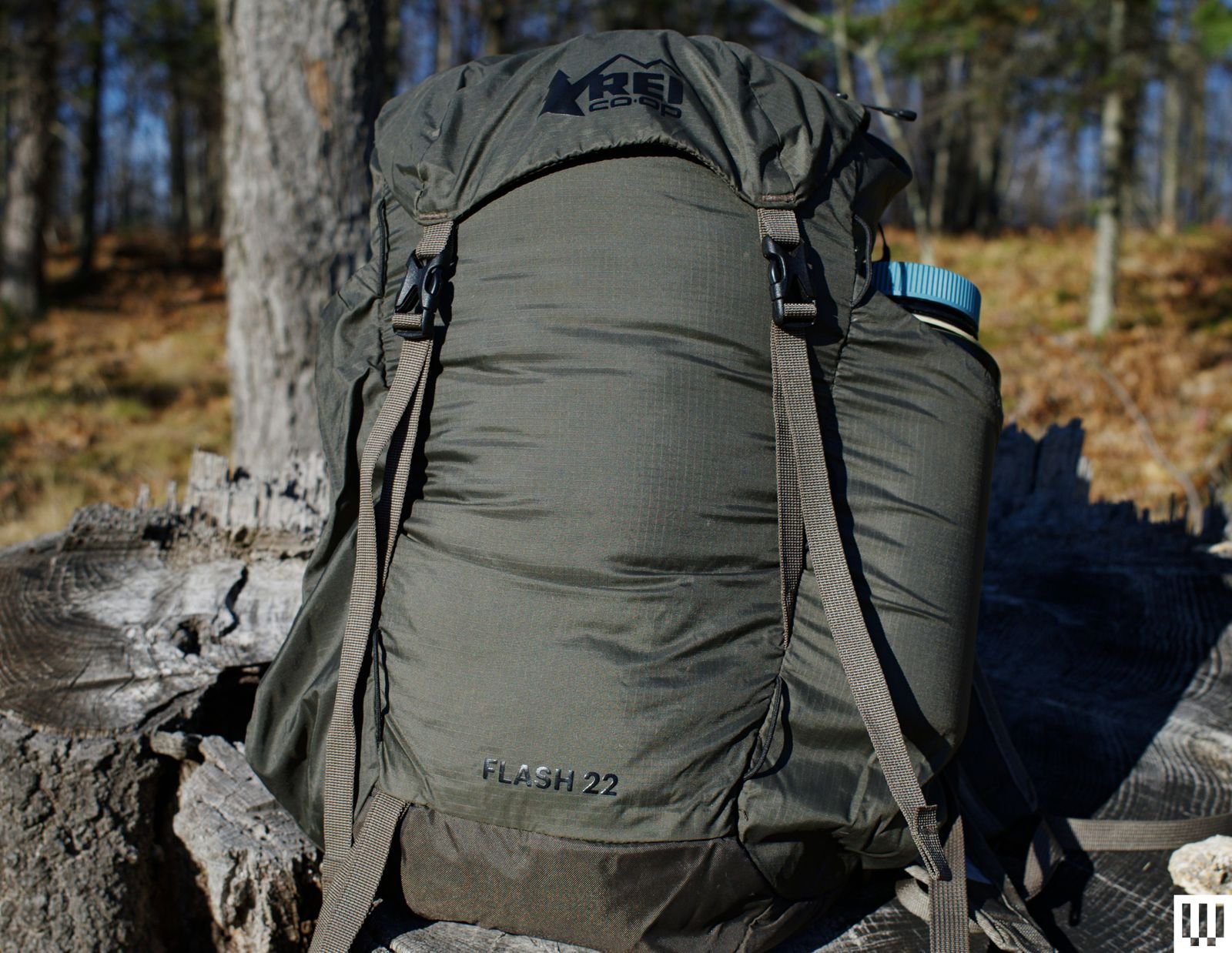 Image may contain Bag Backpack Clothing Coat Jacket Backpacking and Person