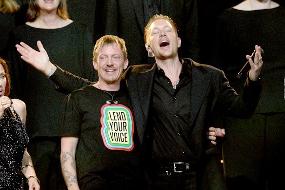 James and Rob Farnham on stage at the concert honouring his father.