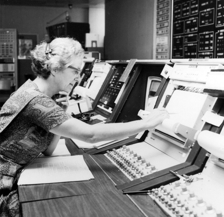 Nancy Grace Roman, US astronomer, operates equipment in the control room for the Orbiting Astronomical Observatory satellite, in 1972.