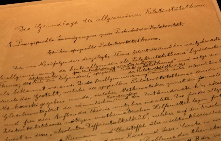 A handwritten manuscript page from Albert Einstein's General Theory of Relativity, featuring cursive German text on yellowed paper.