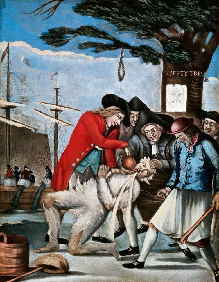 An illustration of U.S. colonists tarring a fellow colonists.