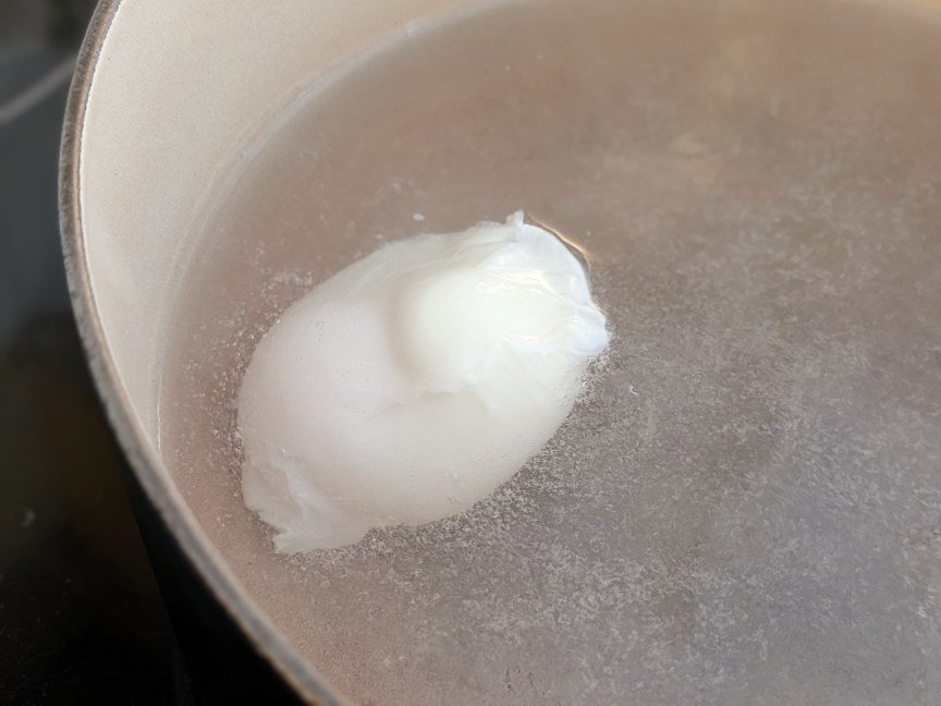 strained egg simmering like a tidy package