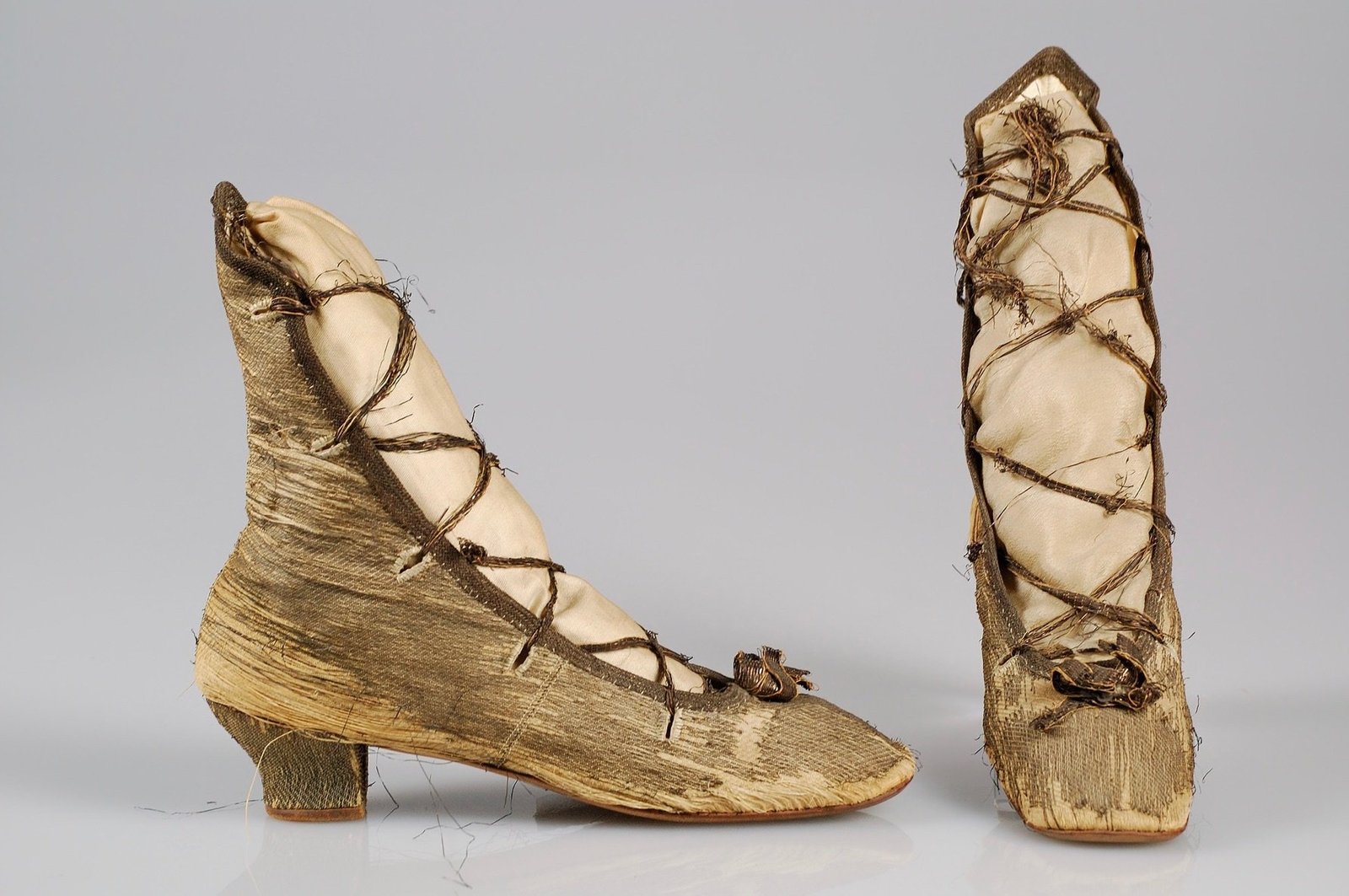 yellow lace up evening boots, probably French, from 1860-69.