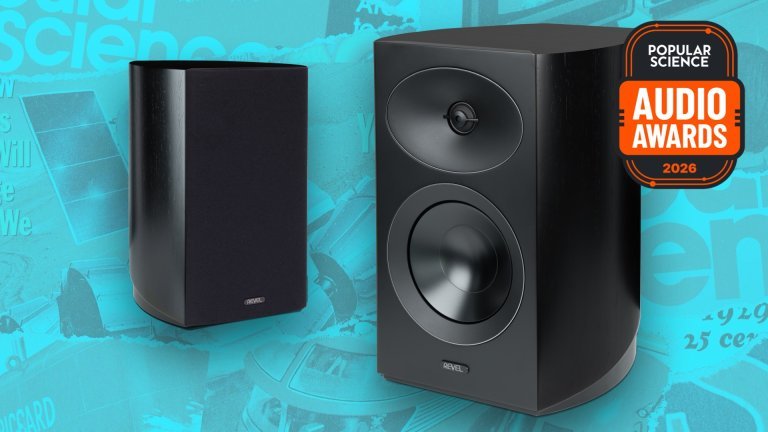 Pair of Revel Performa4 M146 bookshelf speakers in black, one with its grille on