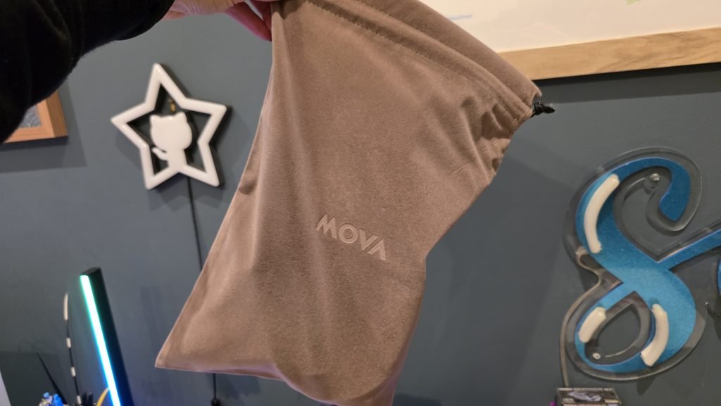 MOVA brown plush bag that fits everything inside.