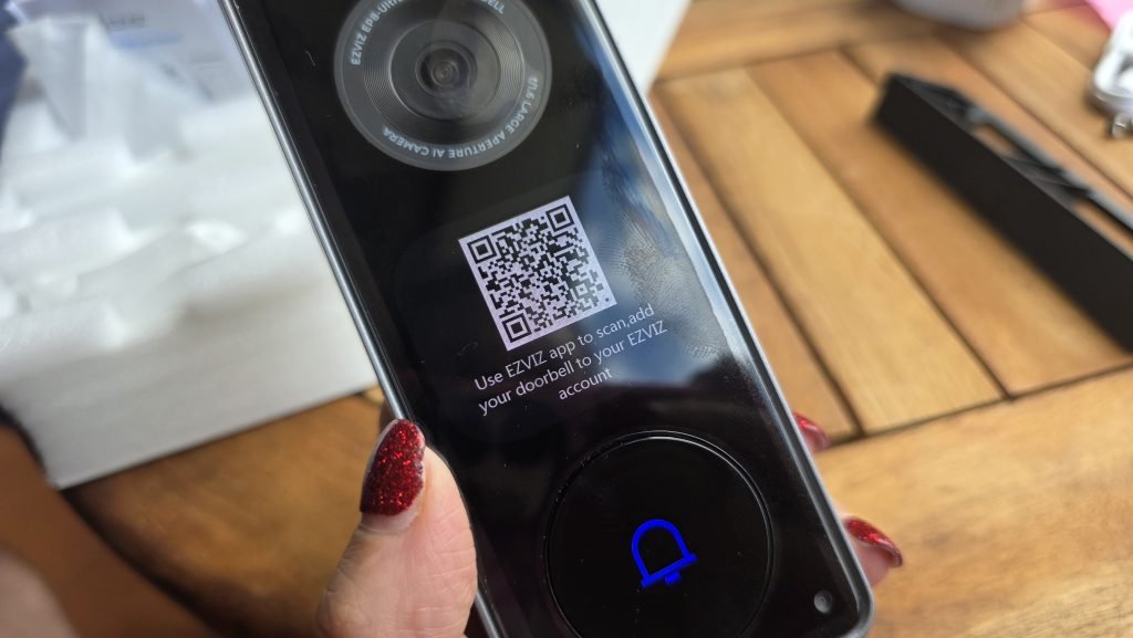 QR code on the screen of the EZVIZ EP8 doorbell, saying "use EZVIZ app to scan, add your doorbell to your EZVIZ account".