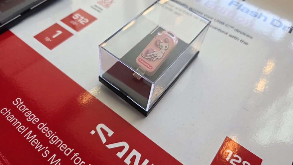 The new Mew flash drive that has a sign saying 512, and 1TB storage. It's inside a Perspex.