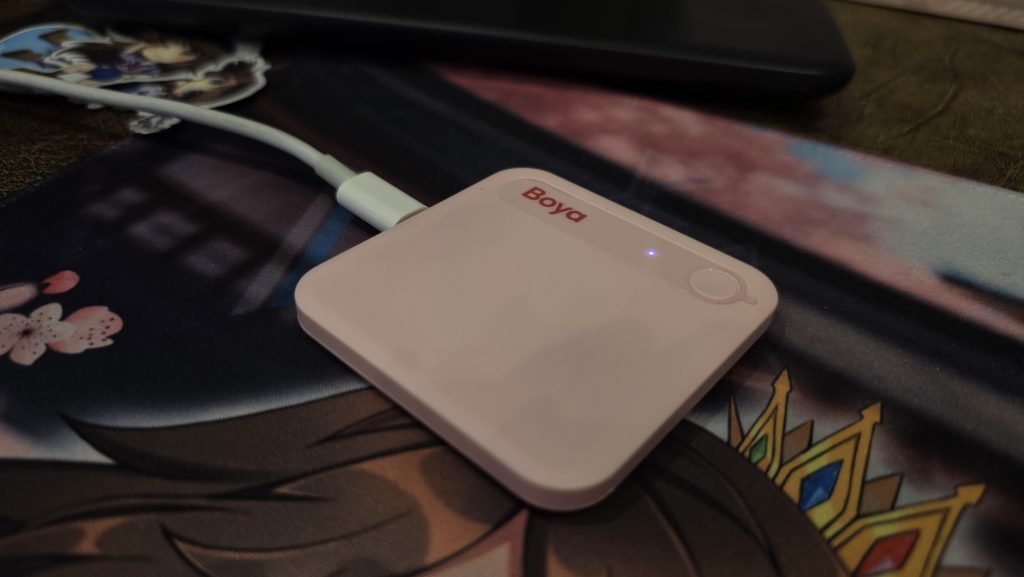 Device plugged in and charging. When it's charging the light is purple.