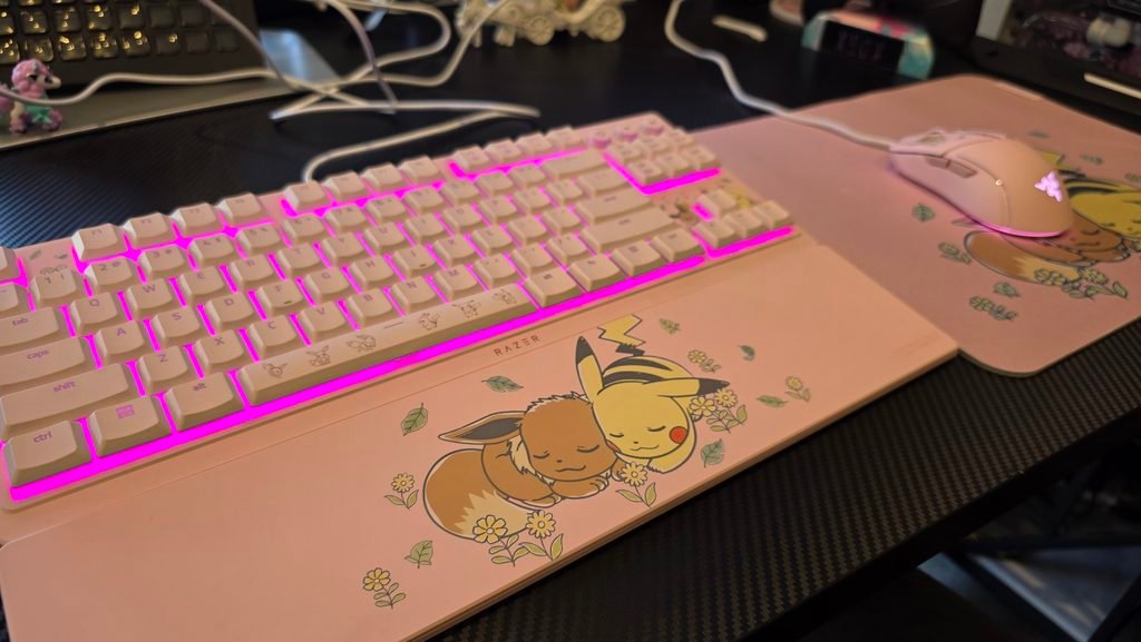 Angled shot of the keyboard showing the graphics on the wristrest, and the glow coming through the keys.