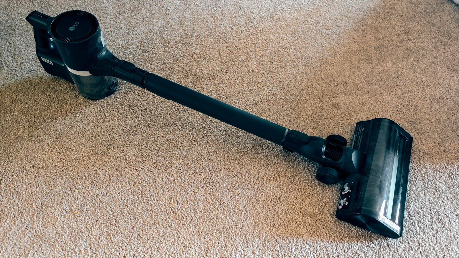 LG CordZero A949 lying on carpet.
