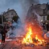 Almost 1,000 arrested as clashes follow another day of mass protests across France