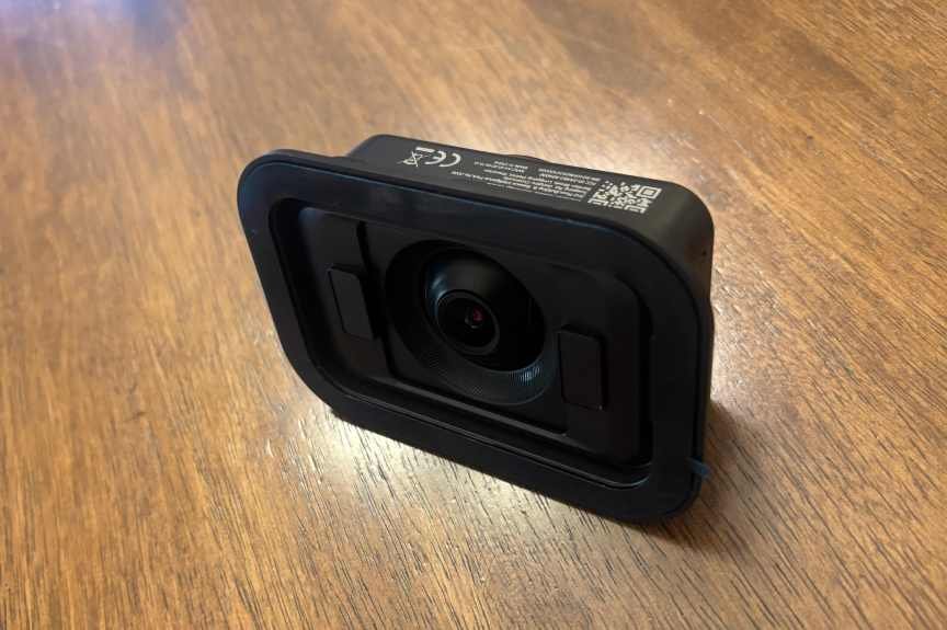 Baseus window camera on table.