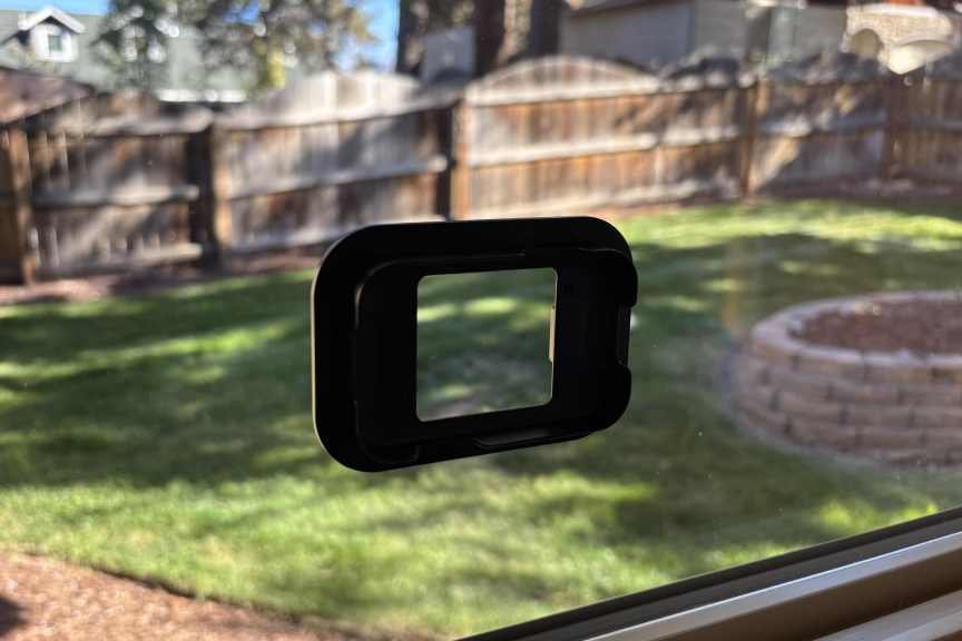 Baseus camera frame on window.