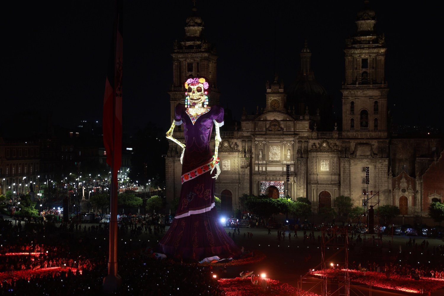 MEXICO CITY, MEXICO - OCTOBER 29: A giant 33-meter-tall Catrina sculpture is displayed at Zocalo Square in Mexico City, Mexico on 29, 2026. Standing 33.411 meters tall and weighing over 100 tons, the installation featuring a steel frame, fiberglass components, a 27-meter-long dress, and 100,000 marigold flowers was recognized by Guinness World Records as the world's tallest Catrina. (Photo by Daniel Cardenas/Anadolu via Getty Images)