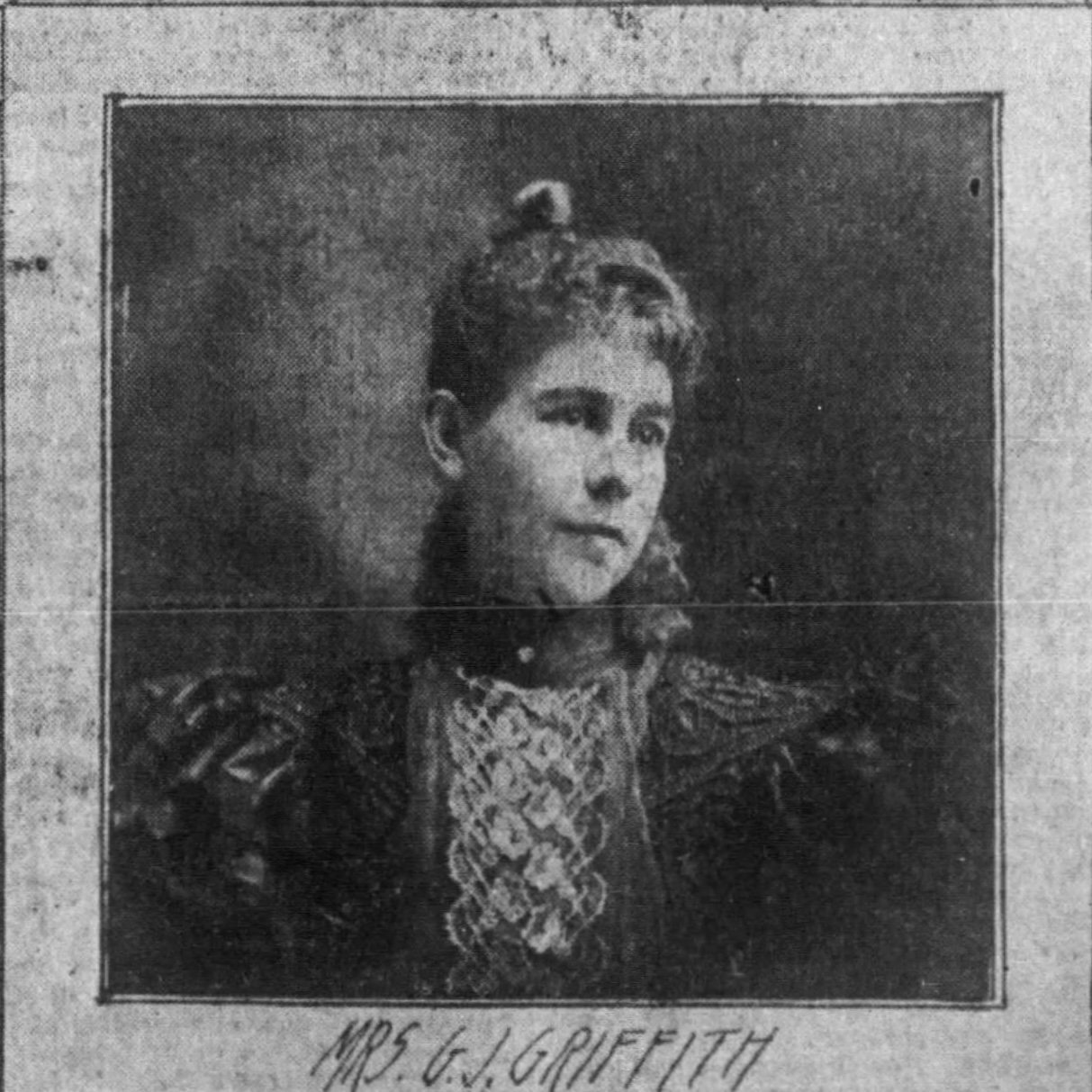 Black and white photograph of white woman from late 1800s