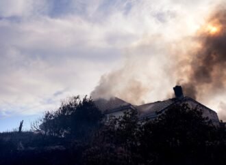 Fire crews battle Southern California blaze that burned 6 homes, led to the evacuation of 16,000