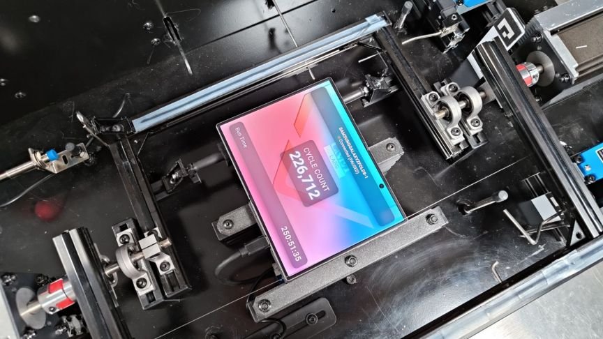 CNET's proprietary phone folding machine.