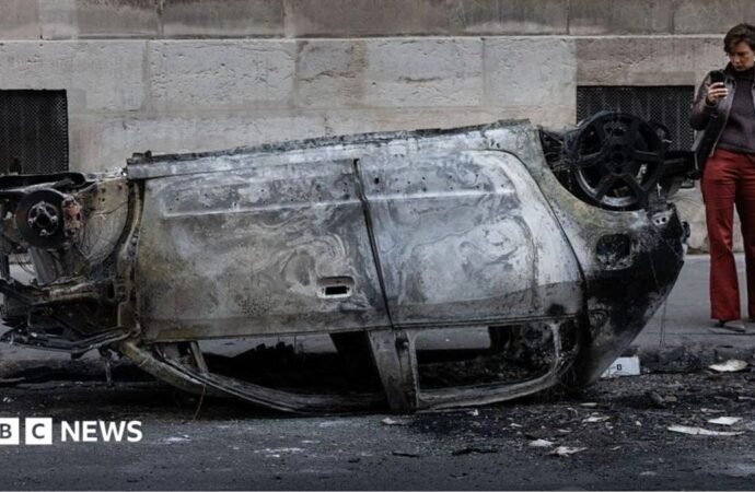 France is divided over who to blame for weekend riots