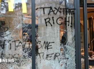 France protests: Burnt out cars and shattered glass on Paris streets after protests turn to riots and looting