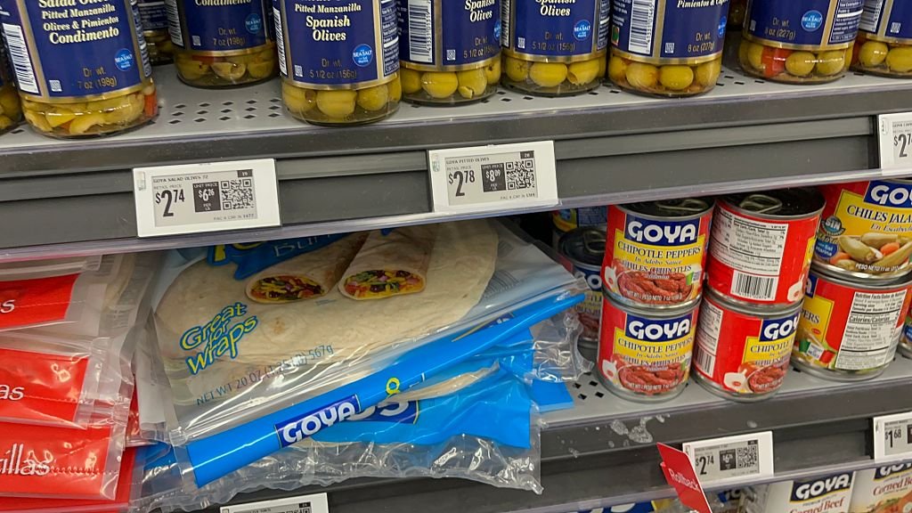 A shelf in the food section of the Albany Walmart shows how digital shelf labels give the prices of items in digital format.