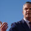 Hegseth visits the long-deployed USS Lincoln to bestow award before ship returns home