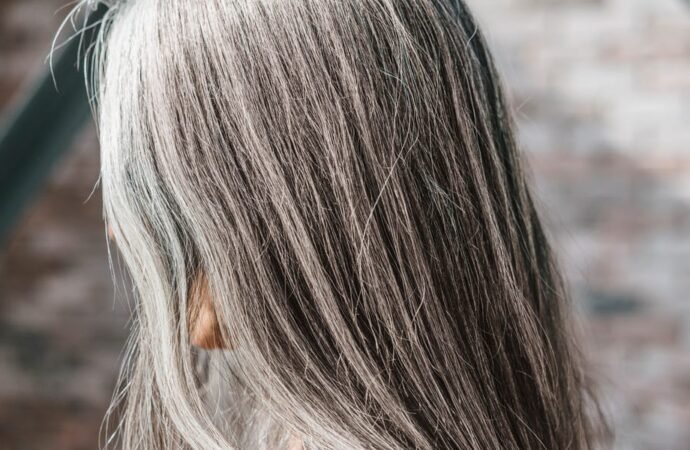 I spent $26,000 coloring my hair over the years. I’m finally going gray, and I wish I’d done it sooner.