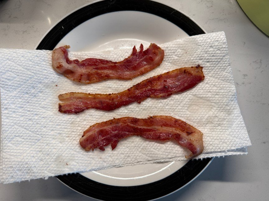 3 strips of cooked bacon on paper towel