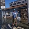 King tides inundate streets and flood homes and businesses along both US coasts