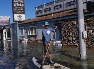 King tides inundate streets and flood homes and businesses along both US coasts