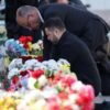 Kyiv bridge hit in further Russian drone attack as German chancellor makes surprise visit