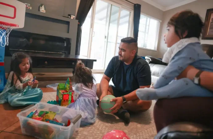More dads taking paid family leave for a new baby, sometimes as much as moms are