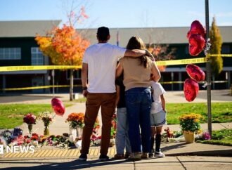 Oregon teacher fought school attacker before armed dad killed suspect