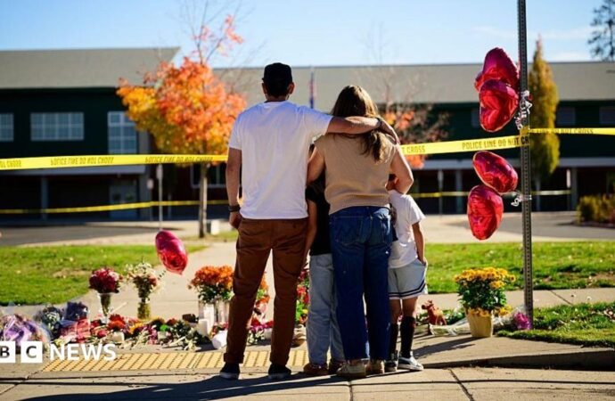 Oregon teacher fought school attacker before armed dad killed suspect