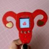 Play ‘Doom’ on this tiny, uterus-shaped period tracker