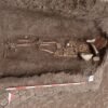 Roman child’s grave contains coin to pay afterlife entry fee