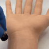 Watch this invisible tattoo appear under UV light