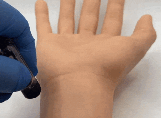 Watch this invisible tattoo appear under UV light