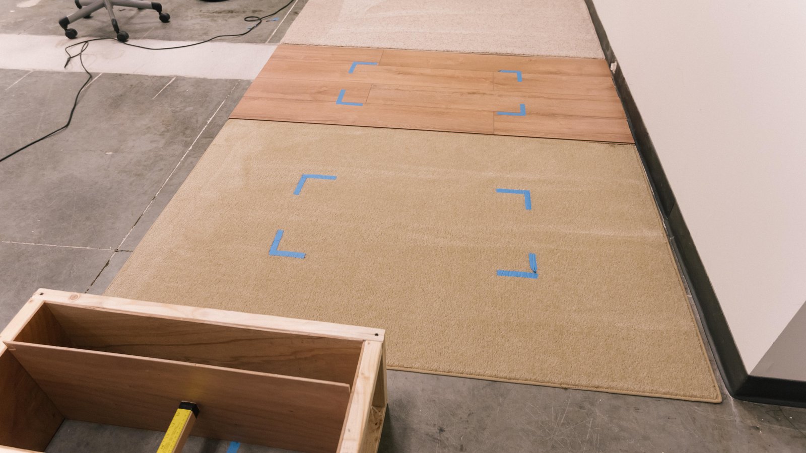 Three types of flooring surfaces to test vacuums.