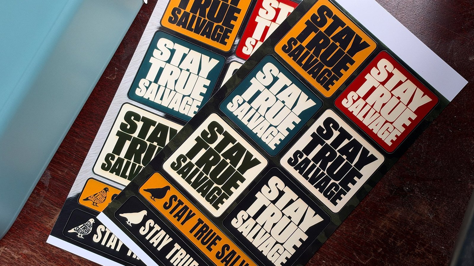 Cricut StickerPix Print + Cut example stickers on a desk