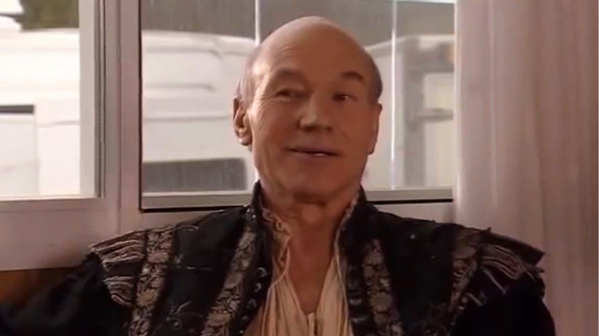 Patrick Stewart dressed in Shakespearean garb from an episode of Extras.