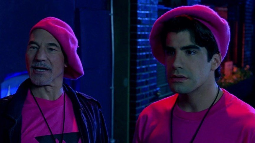 Patrick Stewart and Bryan Batt wear pink berets in a production still from the movie Jeffrey.