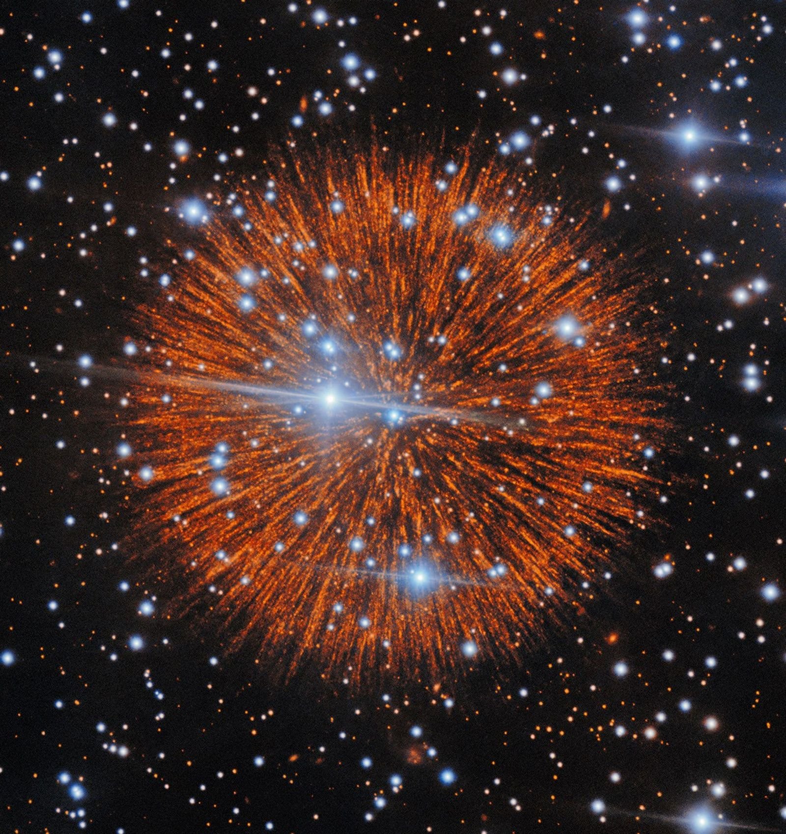 Against a background of bright stars is a red sphere with lines exploding out in each direction like a firework or a pompom.
